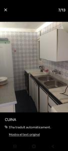 a kitchen with a sink and a counter top at ,1 habitacion in Esplugues de Llobregat