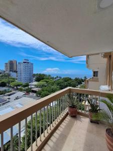 a balcony with a view of a city at Troya 701 in Gaira