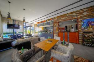 a restaurant with a table and chairs in a room at KS Habithouse GLORY LIFE LARA in ANTALYA in Antalya