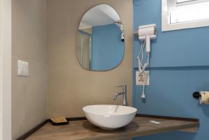 a bathroom with a bowl sink and a mirror at Room in Bloom Bed and Breakfast in Terlizzi +45 photos