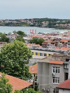 a view of a city with buildings and a body of water at Guest house Villa Stefi in Sozopol