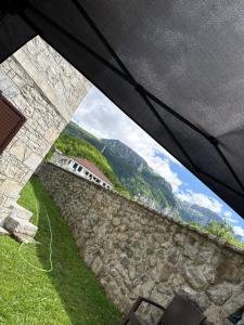 a view from the inside of an umbrella at Guest House Vuthaj in Vusanje +1 photo