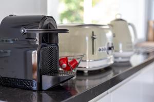a toaster sitting on top of a kitchen counter at Villa La Gioia in Terra Mala