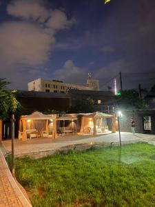 a group of tents in a courtyard at night at Hayq in Yerevan