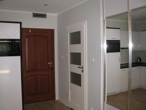 Kuchyň nebo kuchyňský kout v ubytování Blue Mare Apartament u Kwiatków