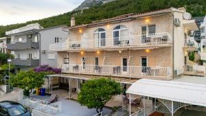an aerial view of a building in a city at Bed and Breakfast Ivona in Baška Voda