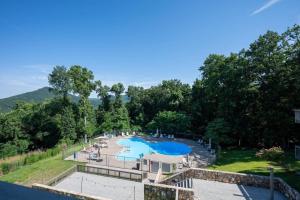 a view of a swimming pool at a resort at Sharp Top Mountain Retreat in Jasper