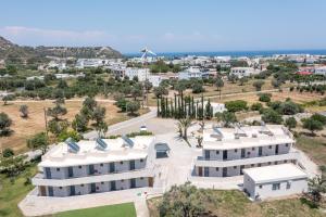 an aerial view of a large white building at GK Home Studios part of GK FITNESS CLUB in Faliraki