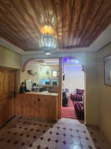 a room with a kitchen and a living room at Azul Atlas Lodge in Imlil