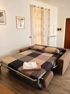a large bed sitting in a room with at Casa Vacanze "Le Tre Formiche" a Poggio Moiano in Poggio Moiano