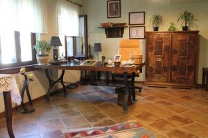 an office with a desk and a chair in a room at The Gallipoli Houses in Eceabat