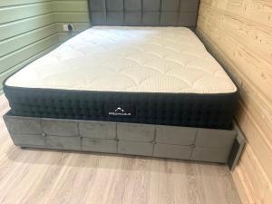 a mattress sitting on the floor in a bedroom at Pennygael in Lanark