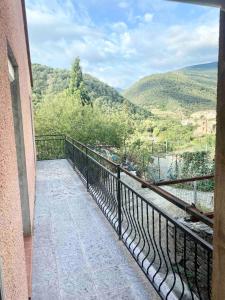 a balcony with a view of a mountain at Large Family Chalet Mountain Views in Olette
