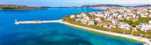 an aerial view of a small island in the water at Pansion Bonaca in Srima