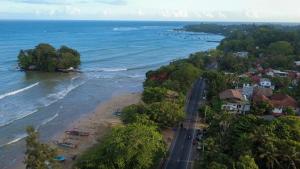 an aerial view of a beach and the ocean at SIlvas Surf Home in Weligama