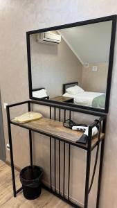a counter with a mirror on top of it at Кристалл in Bosteri