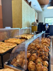 a bunch of pastries on display in a bakery at Tota Marinou in Agioi Apostoli +16 photos