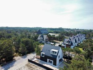 an aerial view of a row of houses at Hothel in Hel