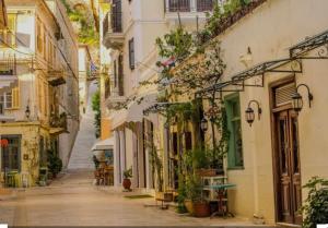 an alley in an old town with buildings at SAmalia Apartments Nafplio in Nafplio