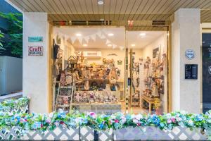 a store window with a bunch of stuffed animals at Stay JADE in Seoul