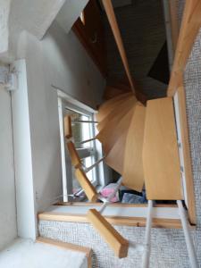an unfinished room with a window and a chair at Haus im Garten in Grebenau