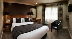 מיטה או מיטות בחדר ב-Tynemouth Grand Hotel