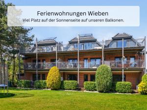 an image of a red brick building at Ferienwohnung Wieben Sankt Peter-Ording in Böhl