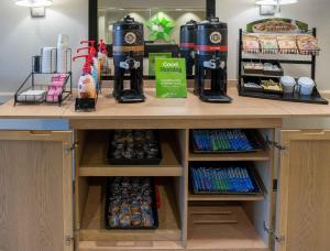 a counter with food and drinks on it at Extended Stay America Suites - Norwalk - Stamford in Norwalk