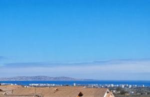 a view of the city from the roof of a building at Acogedor departamento en La Serena in La Serena