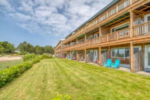 a large house with a lawn in front of it at Neskowin Resort 114 in Neskowin