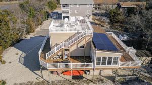 an overhead view of a house with a large deck at Sunset Retreat in North Cape May