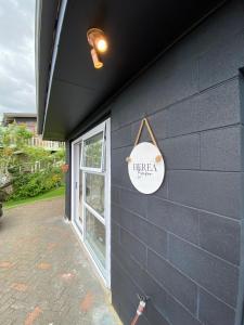 a sign on the side of a building at Herea Bunker in Turangi