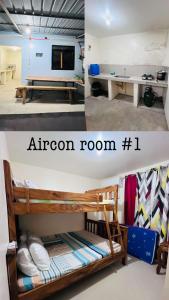 a room with a bunk bed and a desk at R-M Beach Resort in Bolinao