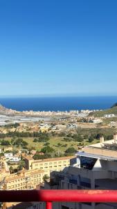 a view of the ocean from the balcony of a building at La Envía Terraza in La Envia