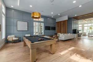 a large room with a pool table in it at Luxury 1bedroom 1bath Tech Hub in Austin