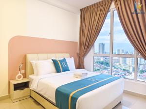 a bedroom with a bed with a large window at Trellis Residence by RR JBcity in Johor Bahru