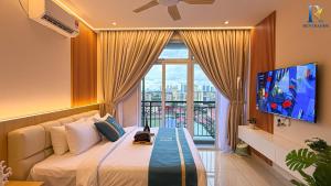 a bedroom with a large bed with a large window at Trellis Residence by RR JBcity in Johor Bahru