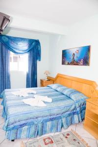 Ένα ή περισσότερα κρεβάτια σε δωμάτιο στο Pousada Cantinho Sonhado