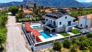 an aerial view of a house with a swimming pool at Dolunay Villas - 2 in Dalyan