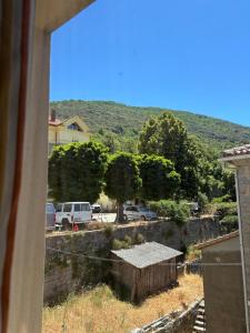 a view from a window of a parking lot at Charming loft in Cozzano in Cozzano