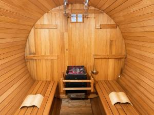 an inside view of a sauna with wooden walls at tocoro. Mt. Fuji Mutsuki in Fujikawaguchiko
