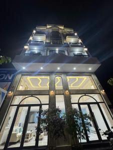 a tall building with lights on top of it at Khách Sạn Anh Khoa 2 in Phan Rang–Tháp Chàm