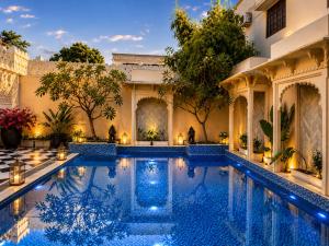 an image of a swimming pool at a mansion at Kaner Bagh A Heritage Boutique Hotel in Udaipur