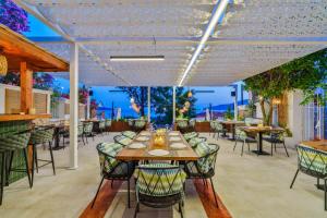 a dining room with a table and chairs at Kalkan Port Hotel in Kaş +26 photos