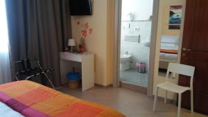 Posteľ alebo postele v izbe v ubytovaní B&b Bagheria