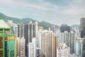 a view of a large city with buildings at Courtyard by Marriott Hong Kong in Hong Kong