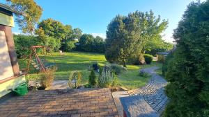 a view of a garden with a playground at Ferienhaus Möschwitz in Möschwitz