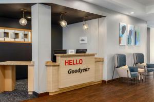 a lobby with a hello goodyear sign and chairs at TownePlace Suites by Marriott Phoenix Goodyear in Goodyear +27 photos