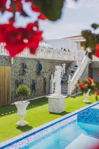 a model of a house with a swimming pool at Meandros Boutique & Spa Hotel - Adults Only in Kalamaki