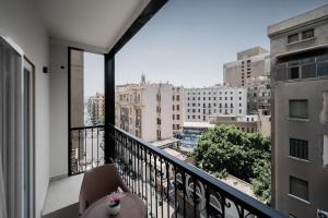 a balcony with a view of a city at Royal Hotel in Cairo